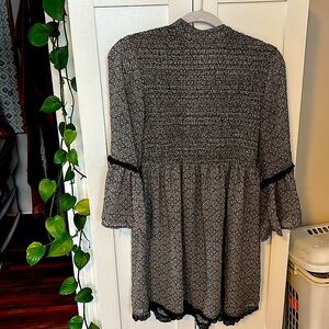Women’s sz large ,sheer mini dress or can be worn as a long blouse.